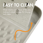 Green Boon Desert bottle organizer on a modern kitchen countertop
