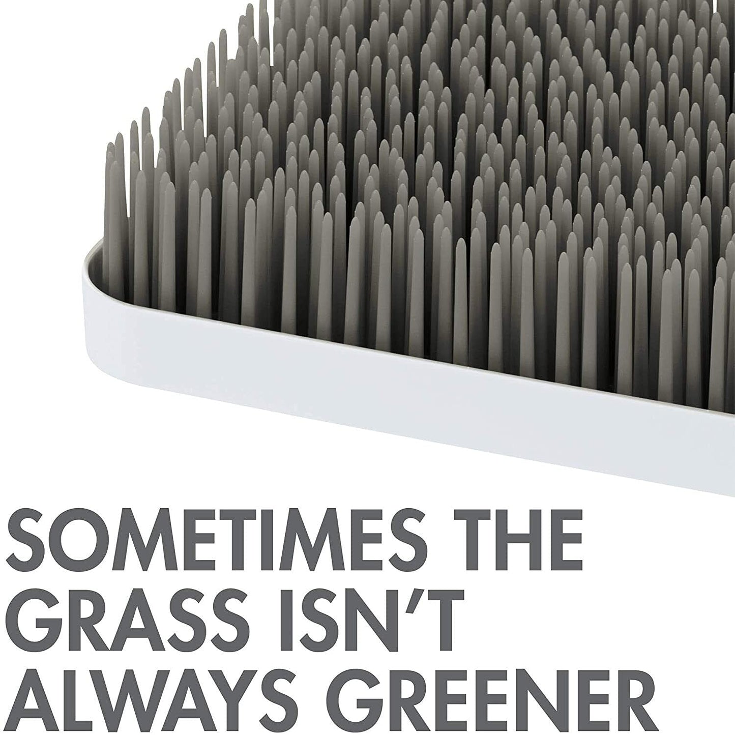Close up of Boon Grass flexible green blades for drying baby accessories