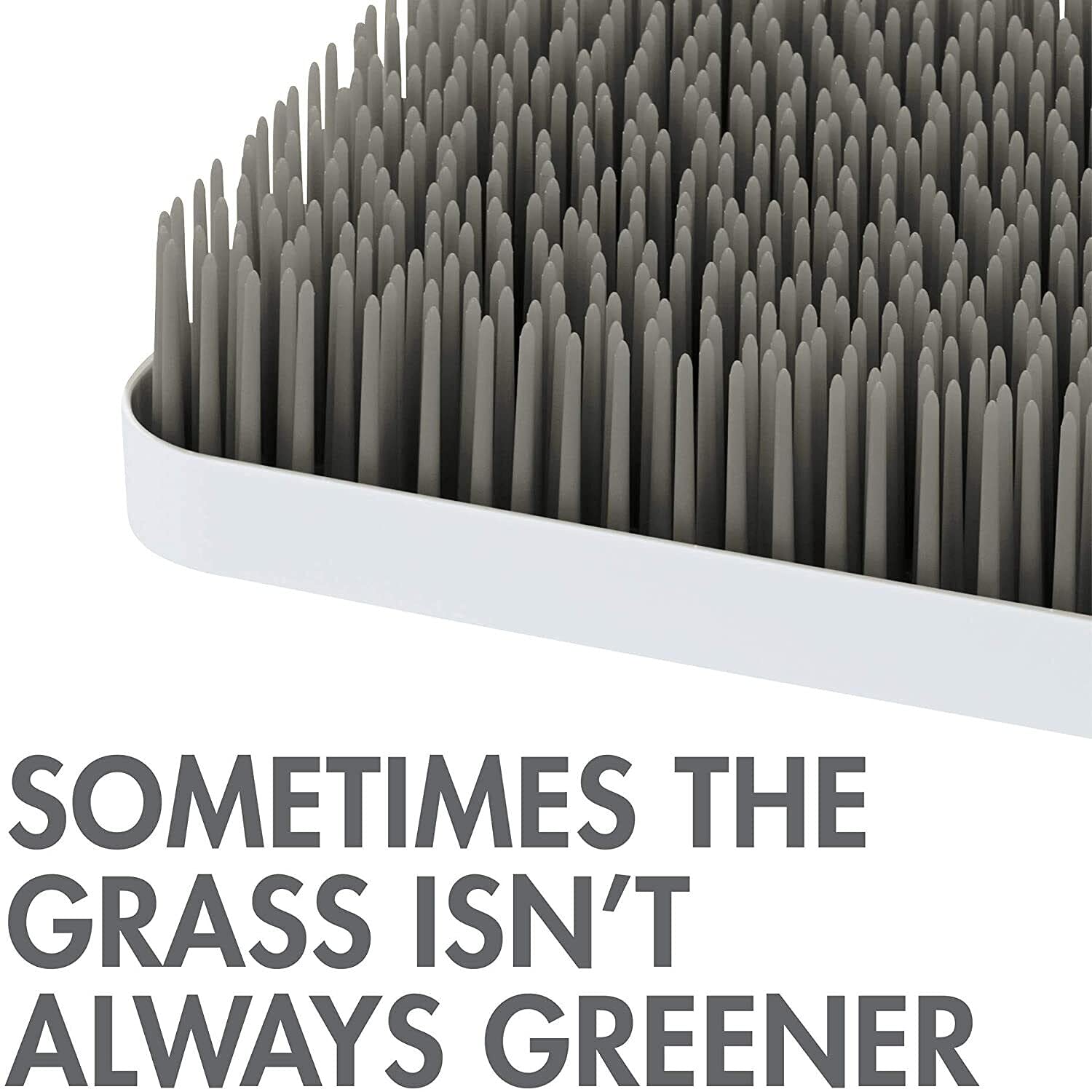 Close up of Boon Grass flexible green blades for drying baby accessories