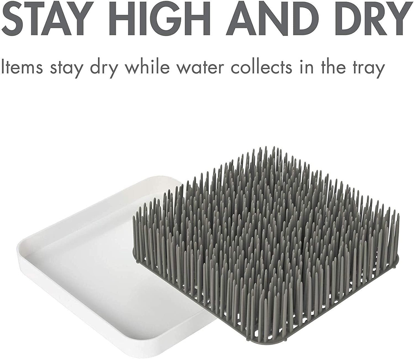 Boon Grass countertop organizer on a kitchen counter