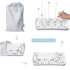 Close up of pegs on Termichy baby bottle drying station