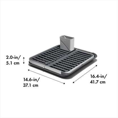 Side profile of the Oxo fold flat dish rack demonstrating stability and non-slip feet