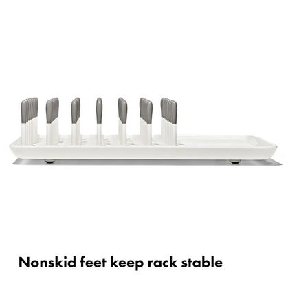 Close up of flexible silicone tipped tines on Oxo Tot rack