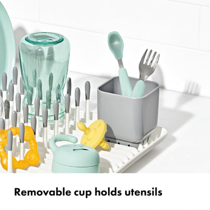 Oxo Tot drying rack showing water drainage channels