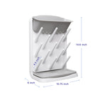 Ubbi drying rack holding multiple baby bottles and pump parts