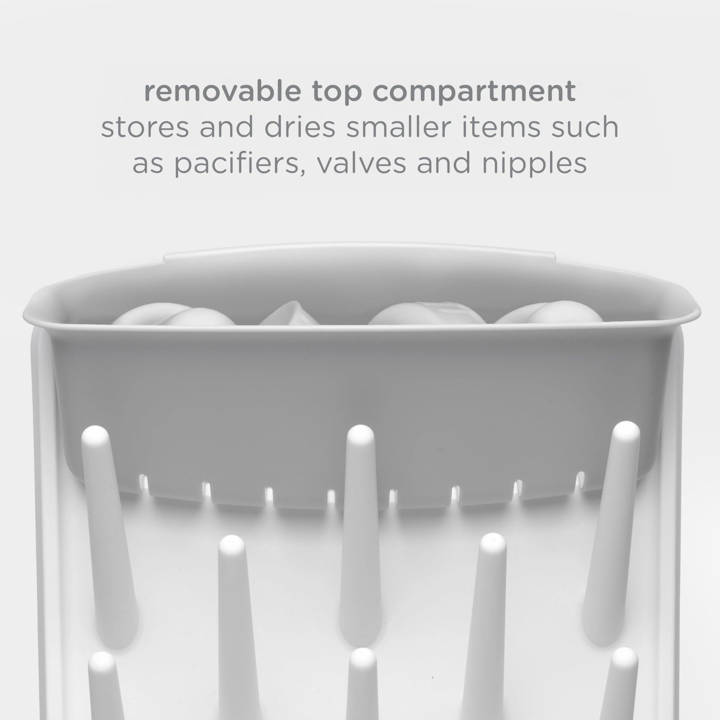 Ubbi baby bottle drying rack showing 13 peg organization