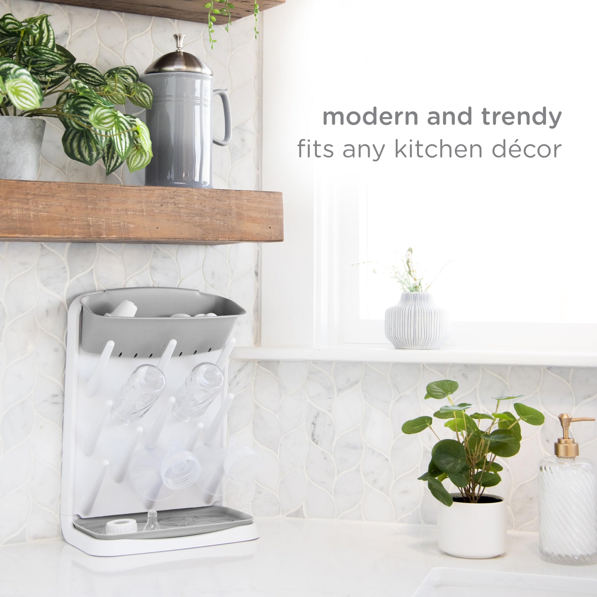 Lifestyle shot of Ubbi drying rack in a modern kitchen setting