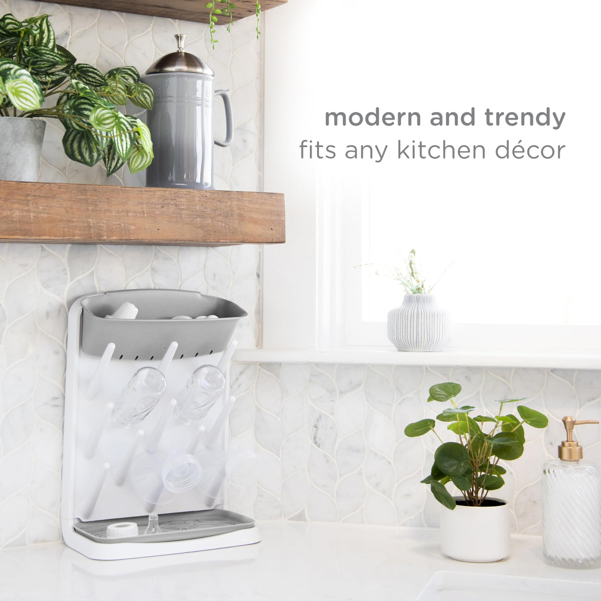 Lifestyle shot of Ubbi drying rack in a modern kitchen setting