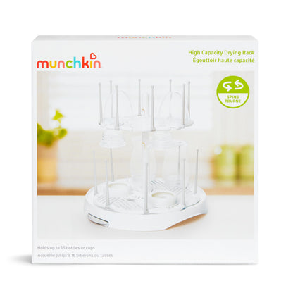 Munchkin drying rack holding baby nipples and pump parts