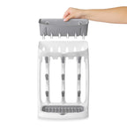 Full view of OXO Tot rack holding nine bottles