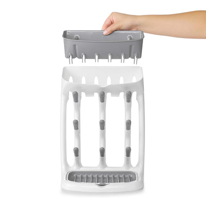 Full view of OXO Tot rack holding nine bottles