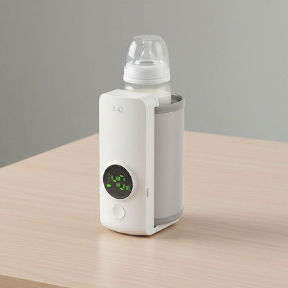 Noxian baby bottle warmer showing digital temperature display