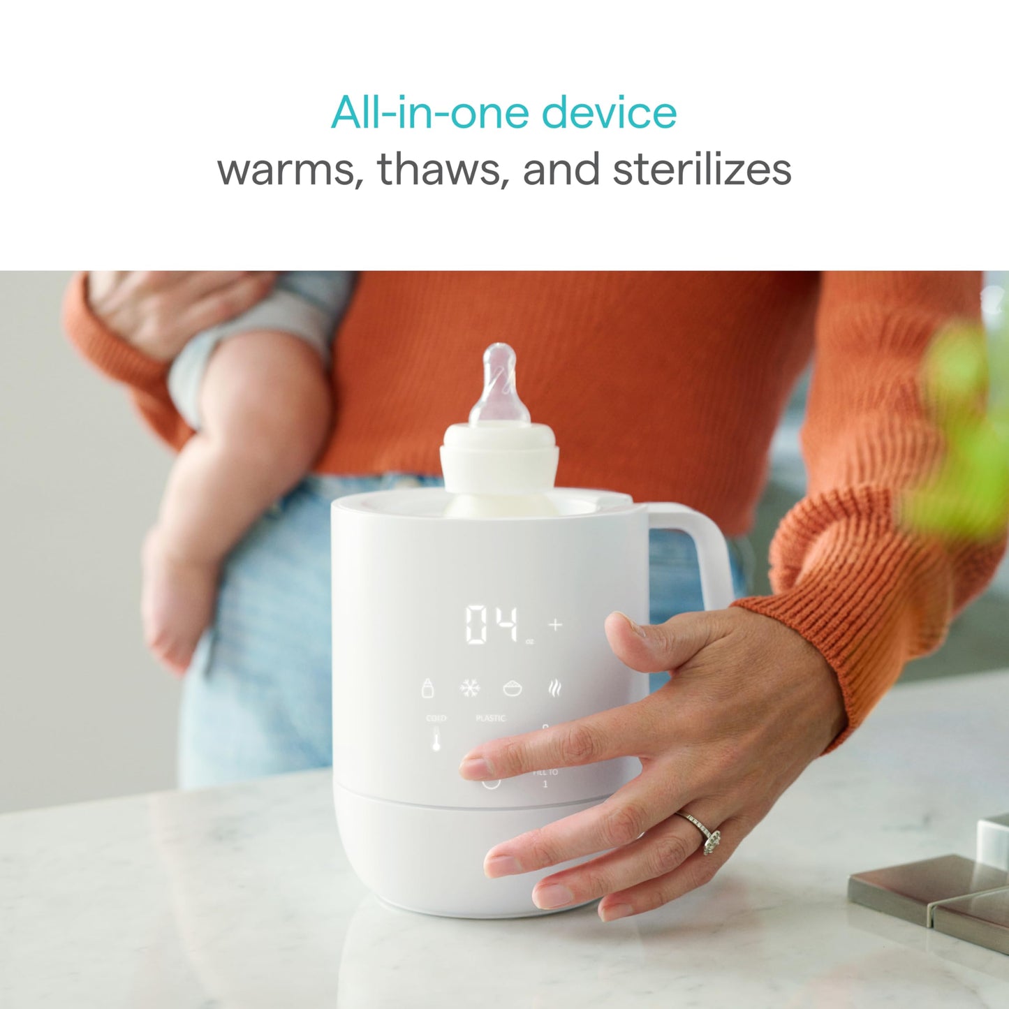 Munchkin digital bottle warmer showing temperature display