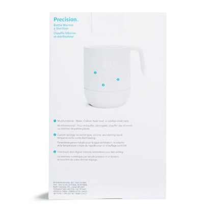 White Munchkin baby bottle warmer in modern kitchen setting