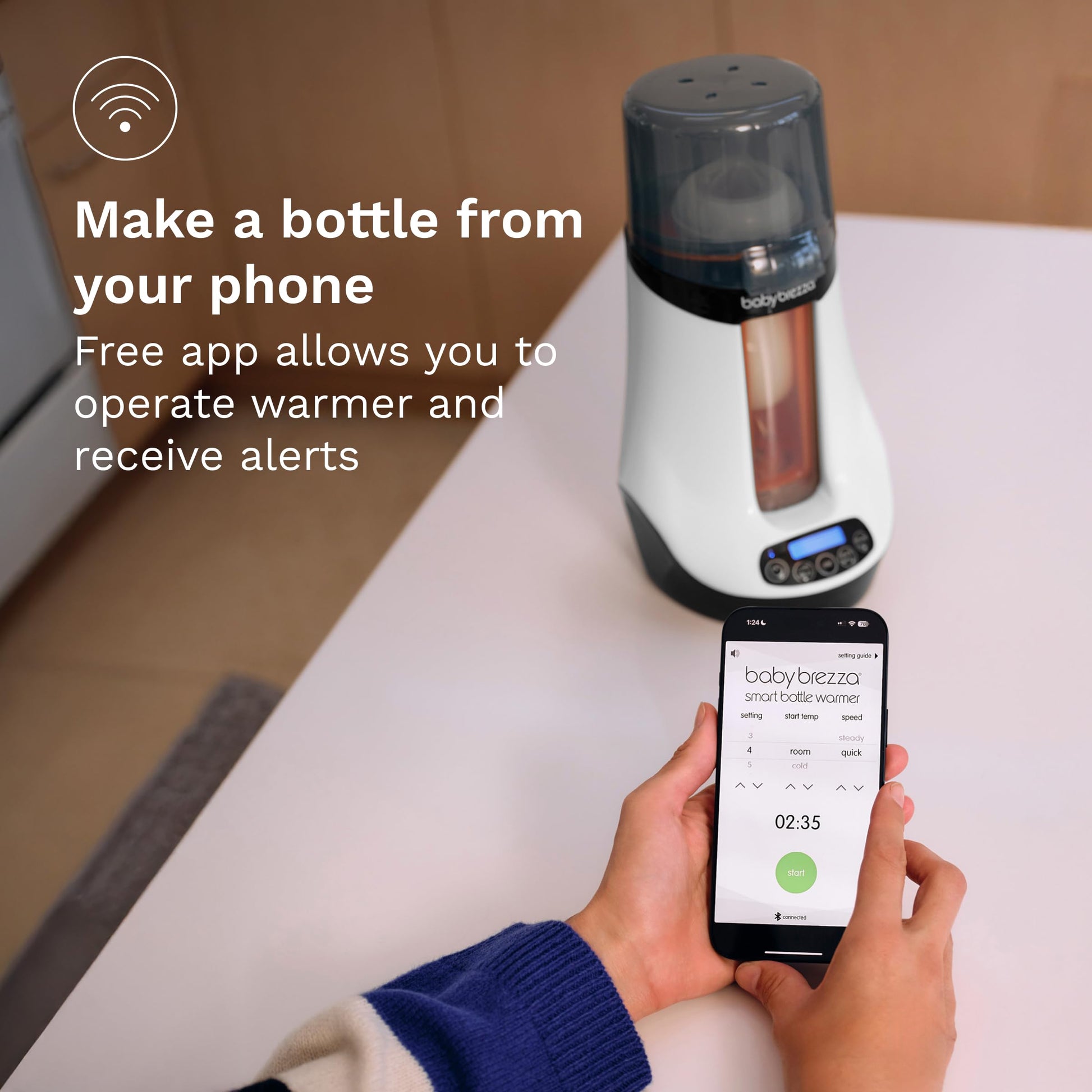 Baby Brezza smart warmer heating a plastic baby bottle