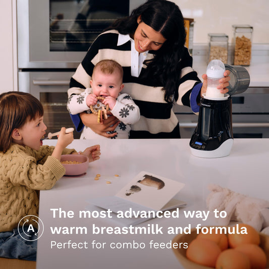 Baby Brezza bottle warmer warming a plastic baby bottle