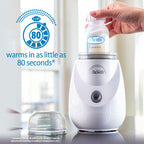 Dr. Brown's bottle warmer with baby bottle inserted