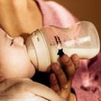 Detachable lid functioning as a warming carafe for baby food jars