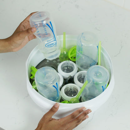 Included plastic tongs for Dr. Brown's steam sterilizer