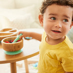 Munchkin suction bowl showing quick-release tab feature