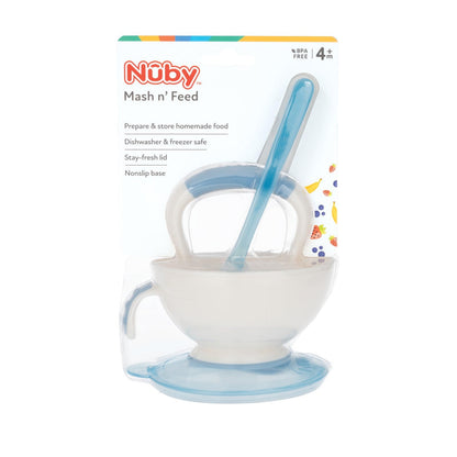 Parent using Nuby masher to prepare fresh baby food