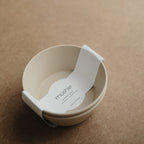 Mushie vanilla bowls stackable feature for convenient kitchen storage