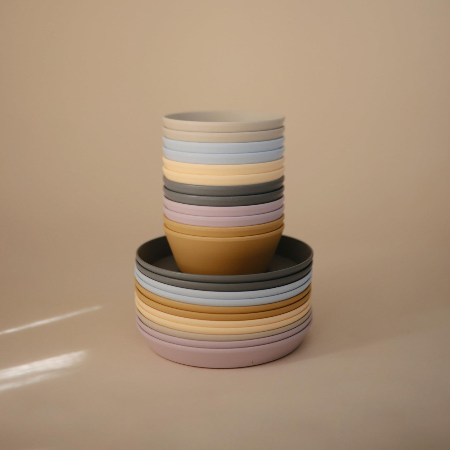 Lifestyle shot of Mushie feeding bowls in a modern home setting