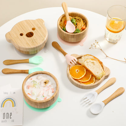 Top view of pink HBM bamboo suction bowl and spoon