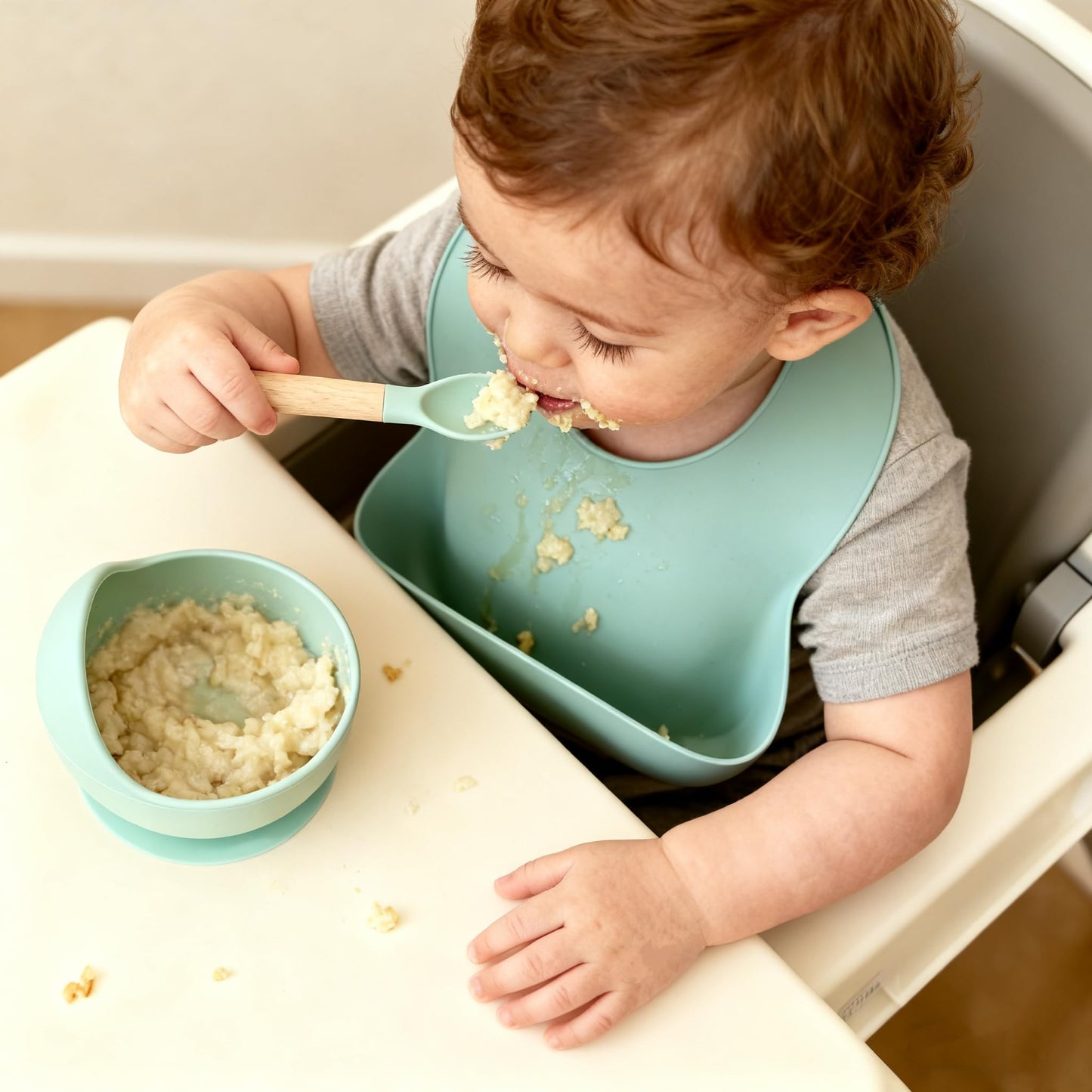 Demonstration of pressing the center of the Ginbear suction bowl for table grip.