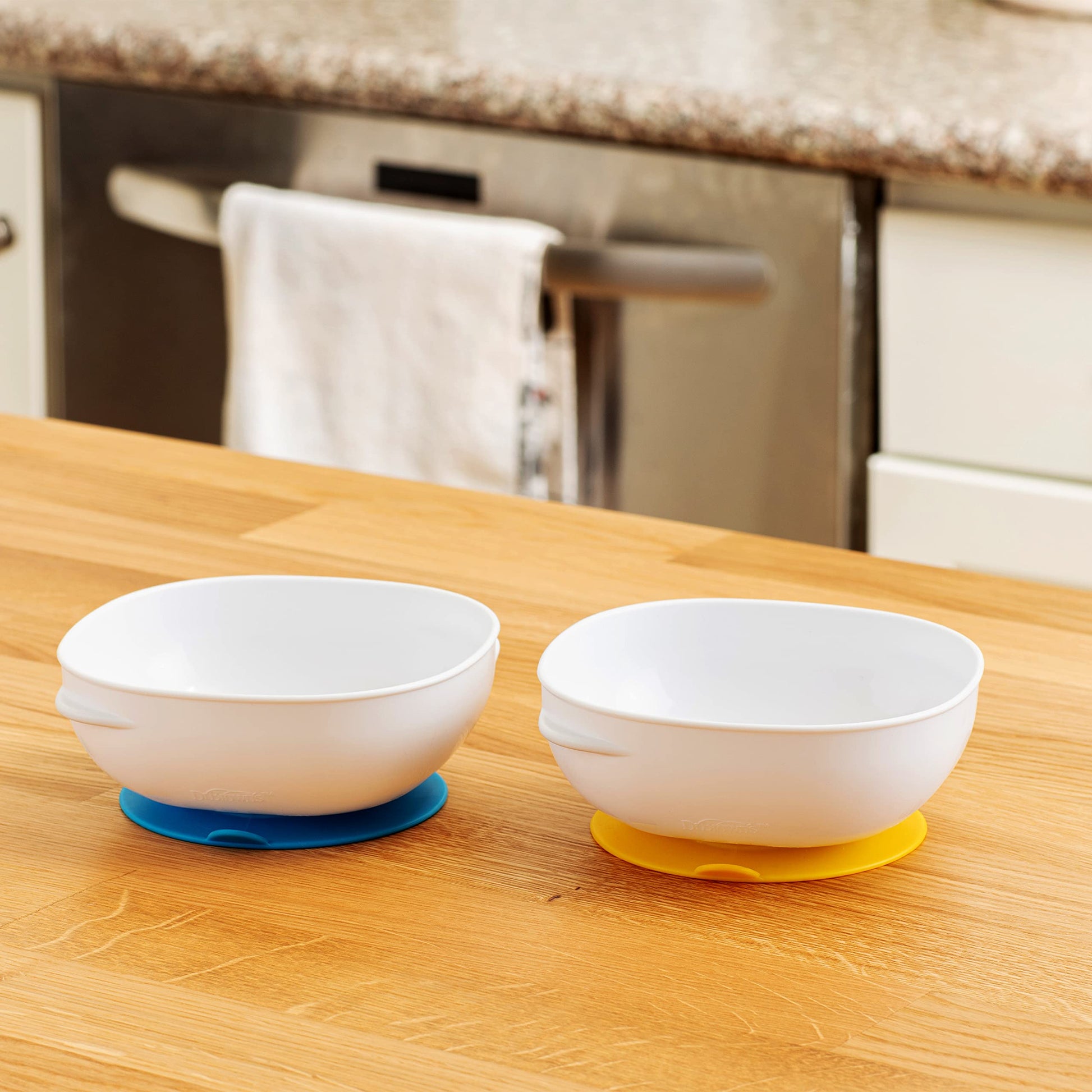 Close up of quick-release tab on Dr. Brown's suction bowl