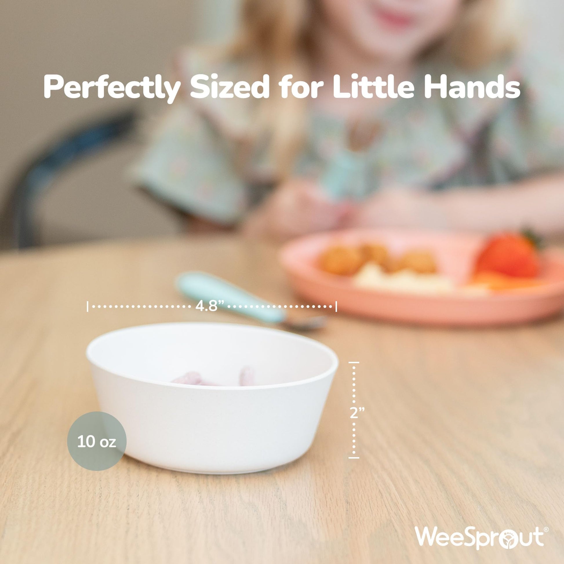 Four colorful pastel kids bowls stacked together