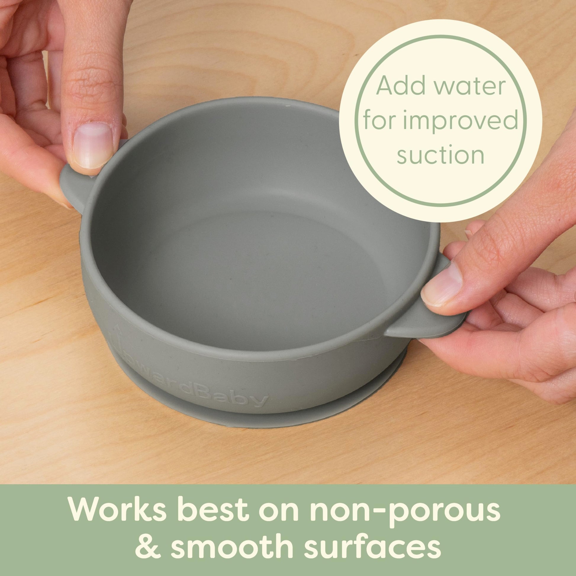 Toddler using UpwardBaby easy grip silicone spoon for self feeding