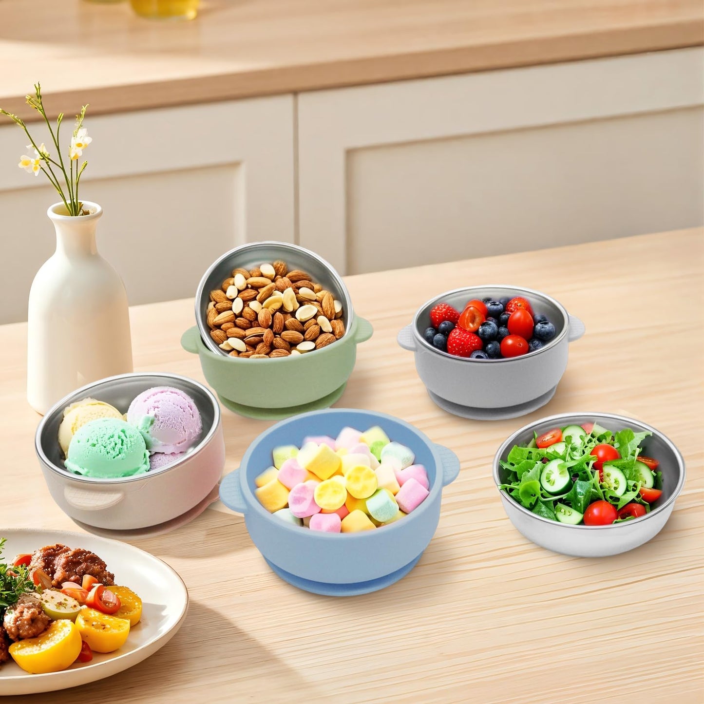Stack of four Jveoo stainless steel snack containers for toddlers