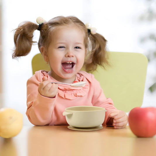 Three silicone baby bowls with suction bases stacked together