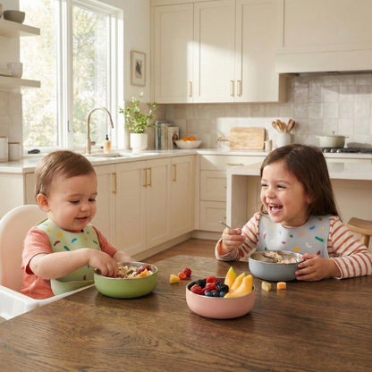 Four colorful Monkey Proof stainless steel toddler bowls stacked