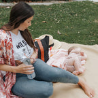 Dr. Brown's maternity diaper bag showing universal electric pump storage compatibility