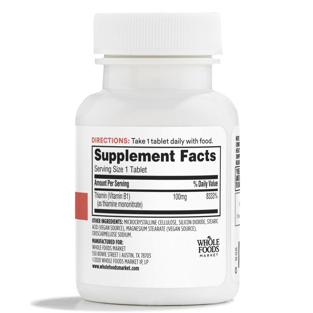Supplement facts label showing 100 milligrams thiamin dosage and ingredients list.