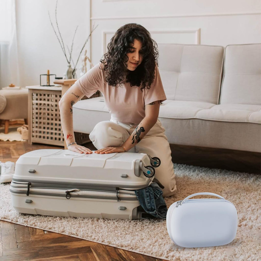 Lifestyle view of the Gowing white electronic breast pump case being placed into a mother's travel diaper bag.