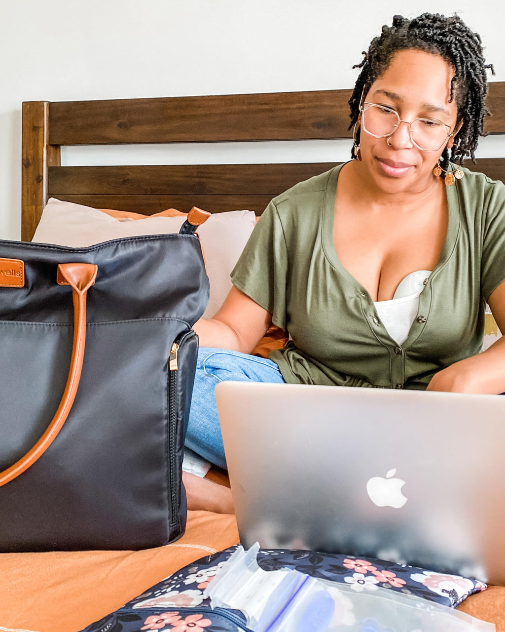 Sarah Wells Abby stylish maternity bag packed with breast pump parts and personal accessories