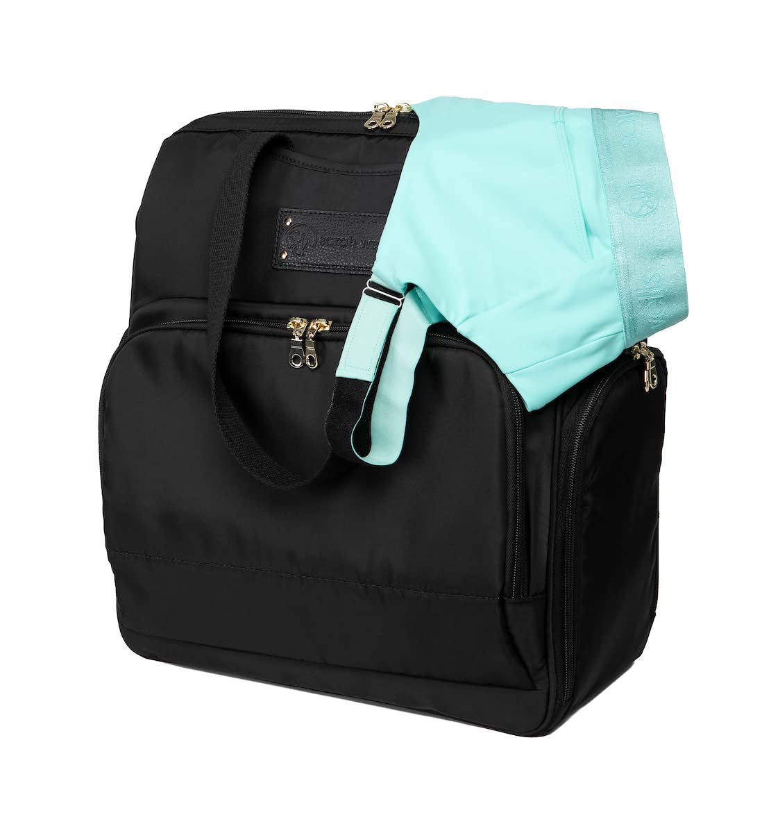 Sarah Wells Norah backpack interior view showcasing the padded laptop sleeve and deep storage.