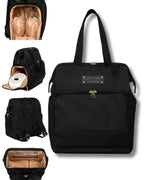 Sarah Wells Norah diaper bag alternative being worn as a hands free travel backpack.