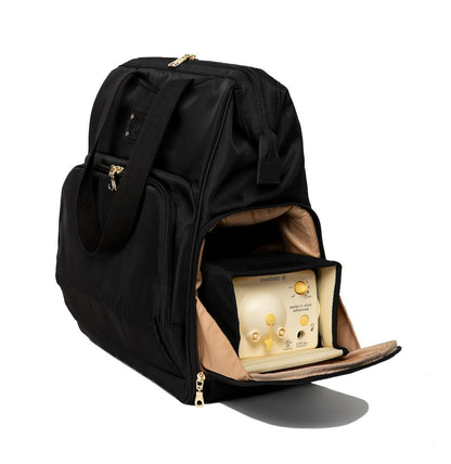 Sarah Wells Norah black backpack packed with a portable breast pump and baby bottles.