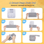Damero gray arrow travel bag hanging from a stroller handle