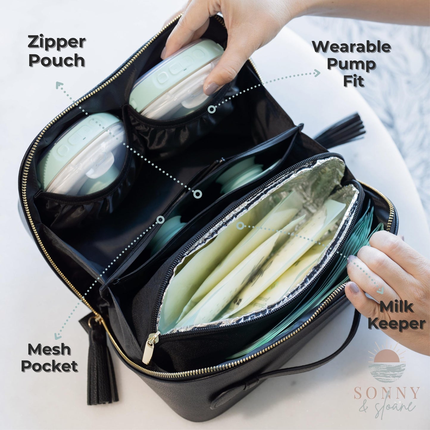 Open view of the Sonny & Sloane wearable breast pump carrying case displaying internal mesh pockets and waterproof lining.