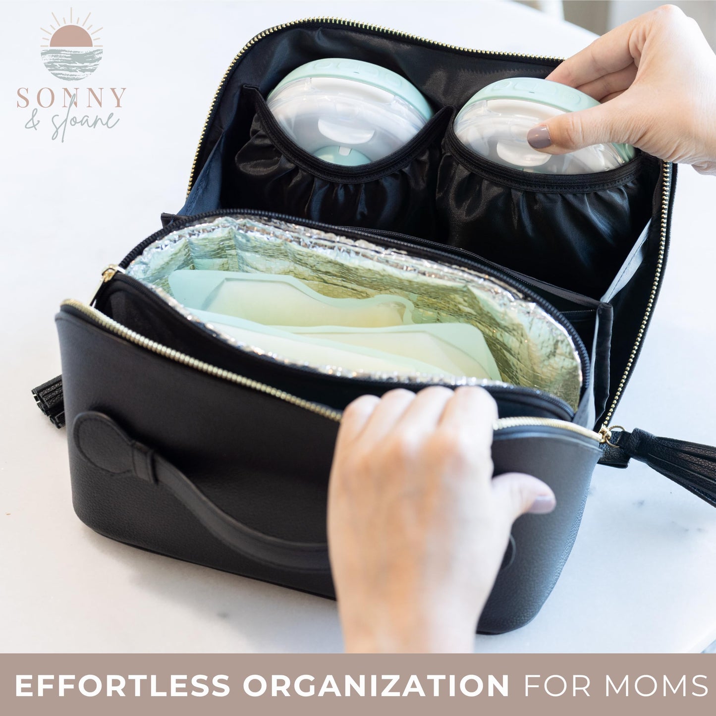 Sonny & Sloane black faux leather cosmetic purse and pumping bag hybrid showing its sleek professional appearance.
