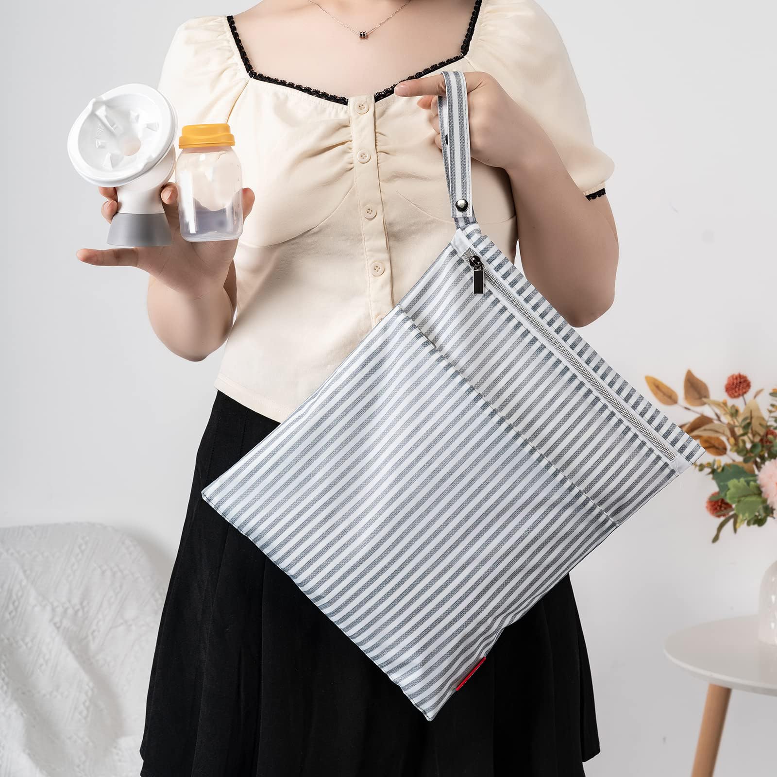 Compact BABEYER wet dry bag folded down into a travel handbag size for office commuting