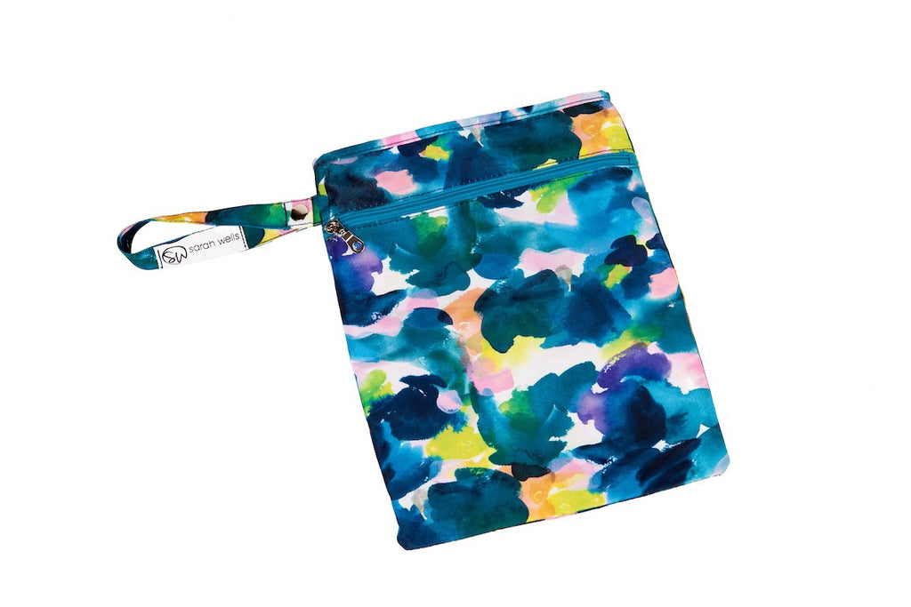 Front zippered pocket detail of Sarah Wells Pumparoo bag storing valves and membranes