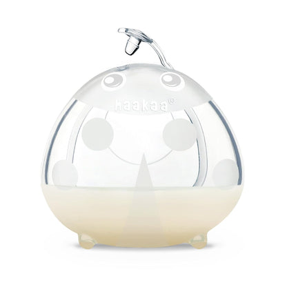 Haakaa Ladybug breast milk collector inside a nursing bra