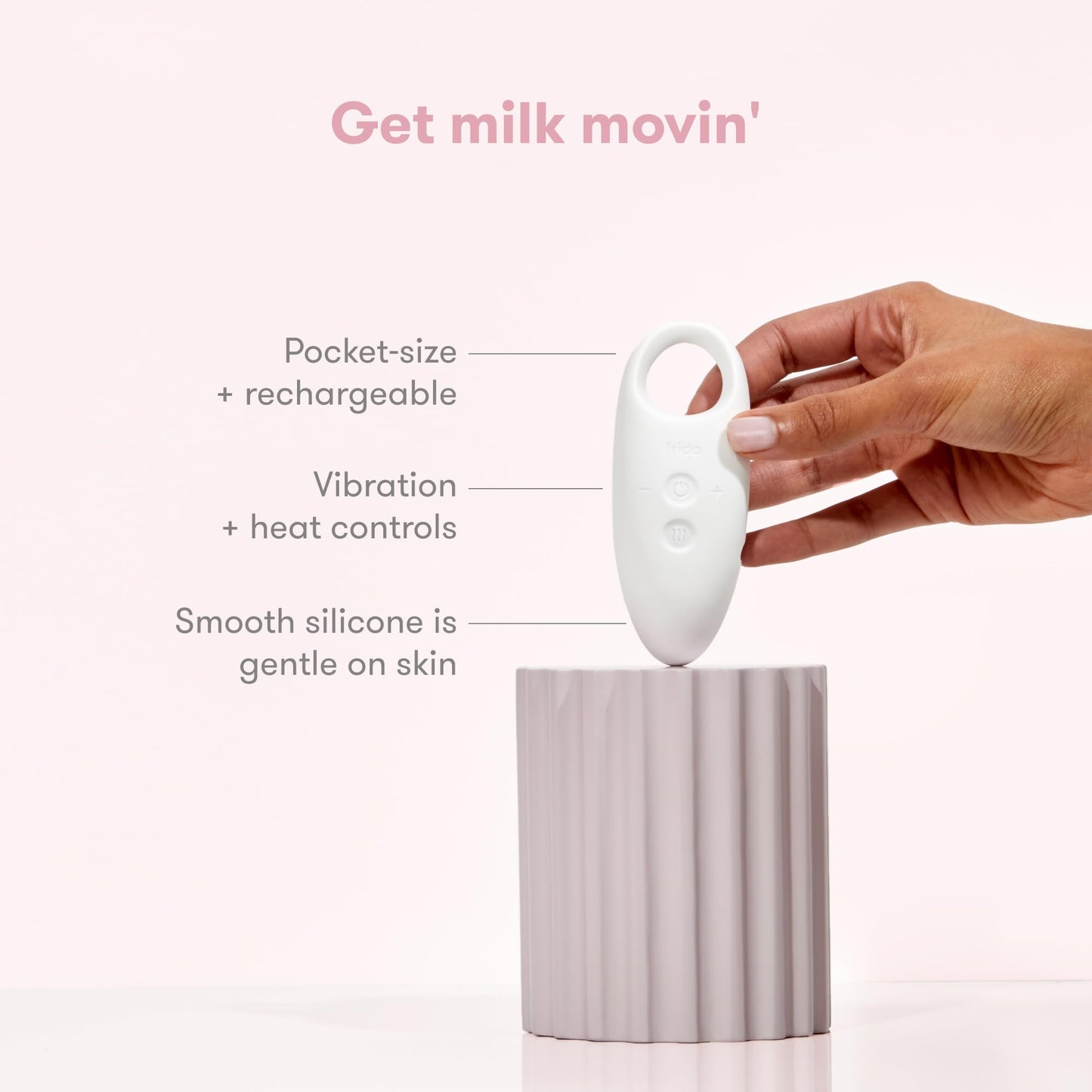 Frida Mom lactation massager showing USB charging port