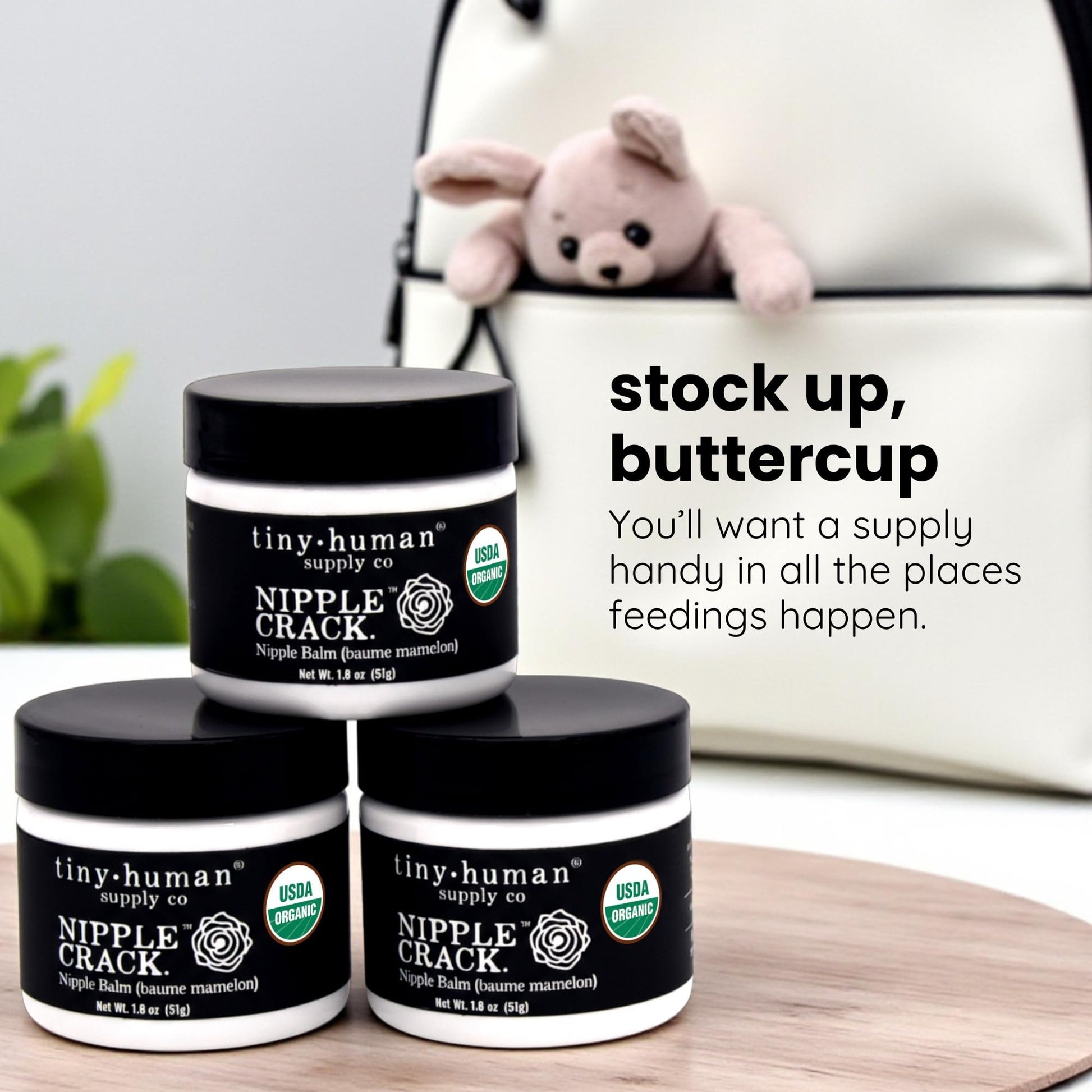 Organic lanolin-free nipple butter jar open showing balm